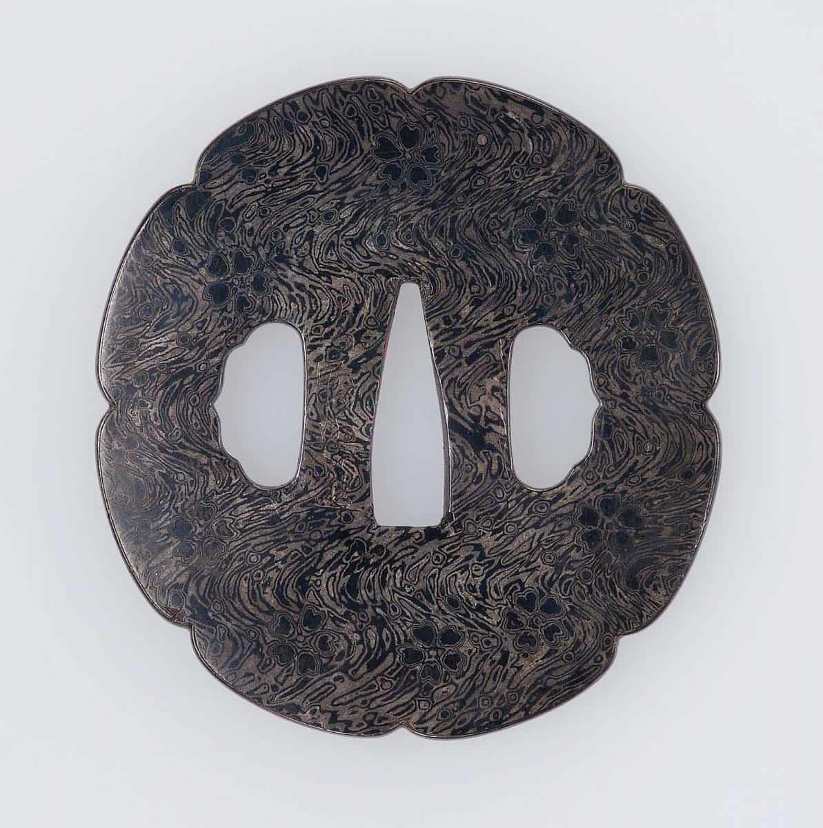 Tsuba with design of cherry-blossom floating on a stream, Museum of Fine Arts, Boston