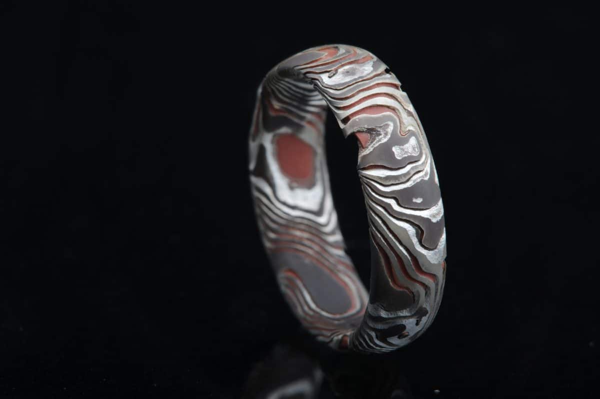 Stunning Wedding Band: sterling silver and copper ring - unique artisan  design - handcrafted in half sizes for a custom fit. | Silver, Ring  designs, Unique rings