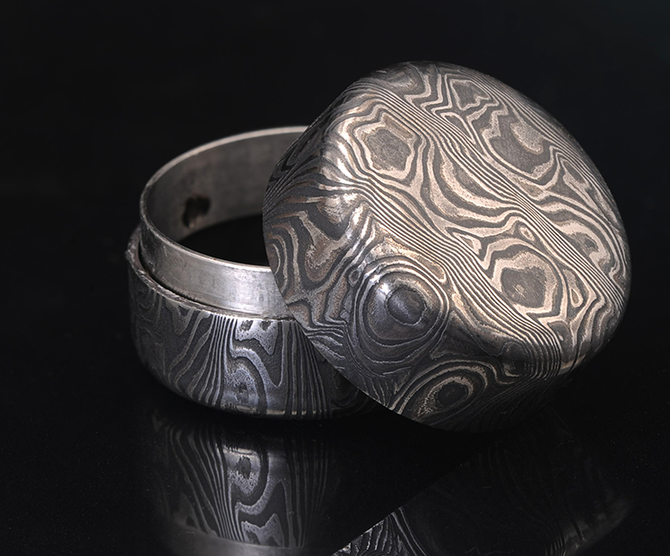 blackened stainless steel box