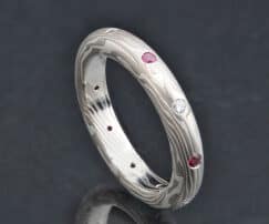WEDDING BAND WITH DIAMONDS AND RUBIES